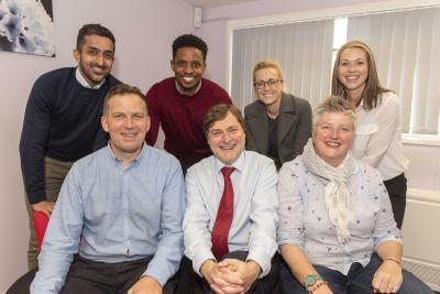 Councillor John Reynolds, Cabinet Member for Children and Young People, front centre, meets members of the new Power2 team including, front left, Head of Service Inclusion Support Rob Hart, front right, Service Manager Celia Payne and back row, left to right, Educational Psychologist Yuvender Prashar, Counselling Psychologist David King, Social Worker Lisa Marie-Lane and Team Manager Hannah Bates