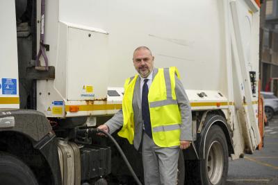 Councillor Craig Collingswood, cabinet member for environment and climate change at City of Wolverhampton Council, with one of the city’s waste collection vehicles that has been taking part in the HVO trial