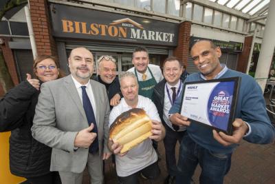 Celebrating Bilston Indoor Market being awarded Highly Commended in the Great British Market Awards 2024 are, from left, Jo Huntbatch, markets general manager; Councillor Craig Collingswood, cabinet member for environment and climate change; Nick Brown, NB Electrical; Matt Price; Matt the Bakers; Mike Otter, Harpers Meats; Stephen Hill, area markets manager and Jag Sandu, Segmore Textiles