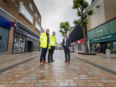 Pictured on the completed repaving in Dudley Street are (from left) Matt Lane, site manager at Taylor Woodrow; Matt Peniket, public liaison and social value co-ordinator at Taylor Woodrow and Councillor Qaiser Azeem, cabinet member for transport and green city