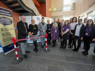 The Deputy Leader of the City of Wolverhampton Council, Councillor Steve Evans, Debra Hickman, Chief Nursing Officer with The Royal Wolverhampton NHS Trust, Trust colleagues and members of the council's Customer Services Team at the new Customer Access Point at New Cross Hospital