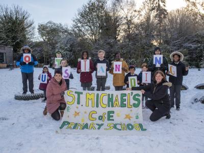 Children from St Michael’s Church of England Aided Primary School celebrate their Outstanding inspection report with Headteacher Kate Jackson and Deputy Headteacher Helen-Marie Navratil