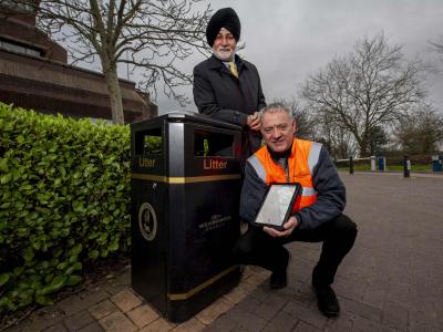 Monitoring information from the new bin sensors are (back) Councillor Bhupinder Gakhal, cabinet member for resident services at City of Wolverhampton Council, with Andy Moore, Public Realm team leader