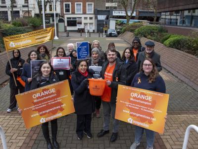 Members of the Orange Wolverhampton team took part in a closing ceremony outside the Civic Centre on Tuesday