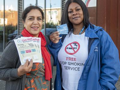 Councillor Jasbir Jaspal, Cabinet Member for Adults and Wellbeing, and Erica Phillip-Hamilton, Community Champion at the Bob Jones Community Hub, are promoting the Live Well Wolverhampton service which is helping residents to quit smoking and manage their weight