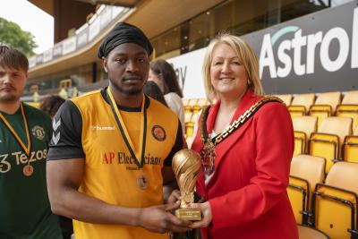 olverhampton Warriors receive their Care Leavers Championship Cup 2024 runners-up trophy from the Mayor of Wolverhampton, Councillor Linda Leach