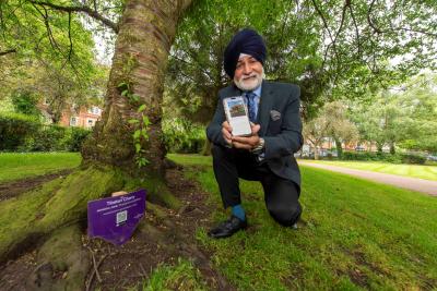 Councillor Bhupinder Gakhal, cabinet member for resident services, explores the hi-tech tree trail in West Park
