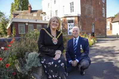 Mayor Councillor Linda Leach and Falklands Conflict veteran Neil Binder enjoy Bilston War Memorial Garden