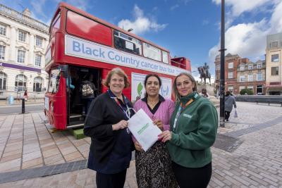 At the Black Country Cancer Bus in Queen Square were, left to right, Lesley Thorpe, Macmillan Personalised Care Project Lead, Councillor Jasbir Jaspal, Cabinet Member for Adults and Wellbeing, and Kassie Styche, Engagement Lead, Black Country Integrated Care Board