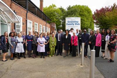 Minister for Children and Families, Janet Daby, with representatives from Graiseley Family Hub and Royal Wolverhampton NHS Trust’s school  nursing, health visiting and community midwife teams