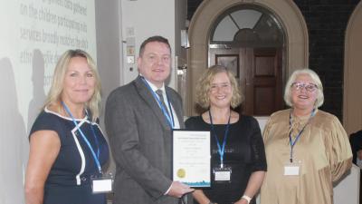 Left to right, with their Team Excellence award are Wolverhampton Music Service's Sarah Fletcher, Ciaran O'Donnell and Sarah Tulley, and Brenda Wile, the City of Wolverhampton Council's Deputy Director of Education