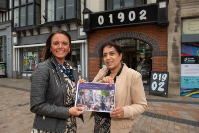 Councillor Jasbir Jaspal, the City of Wolverhampton Council’s Cabinet Member for Adults and Wellbeing, and Clare Dickens MBE, Chair of Wolverhampton’s Suicide Prevention Stakeholder Forum, with a copy of the City of Wolverhampton Suicide Prevention Strategy