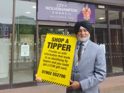 Councillor Bhupinder Gakhal, cabinet member for resident services at City of Wolverhampton Council, with contact details for the Shop a Tipper scheme