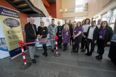 The Deputy Leader of the City of Wolverhampton Council, Councillor Steve Evans, Debra Hickman, Chief Nursing Officer with The Royal Wolverhampton NHS Trust, Trust colleagues and members of the council's Customer Services Team at the new Customer Access Point at New Cross Hospital