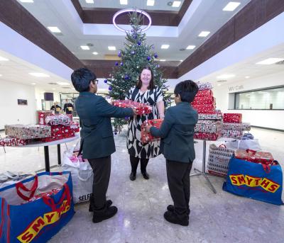 Adopted brothers, 8 and 5, have inspired their school friends to donate Christmas gifts to children in need, spreading holiday cheer in Wolverhampton