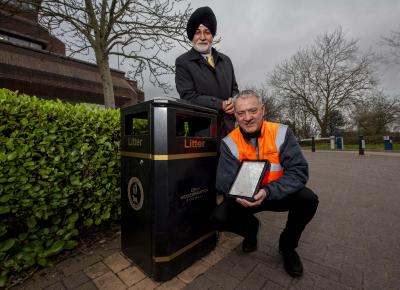 Monitoring information from the new bin sensors are (back) Councillor Bhupinder Gakhal, cabinet member for resident services at City of Wolverhampton Council, with Andy Moore, Public Realm team leader