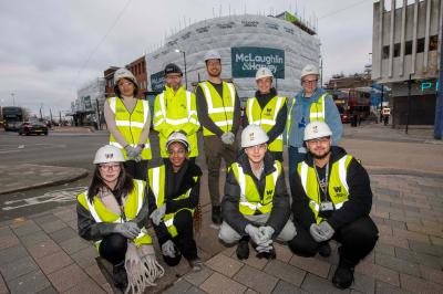 (L-R): In front of the new City Learning Quarter college campus are (back row) - Jas Dolphin, Ministry of Housing, Communities & Local Government, Shane Greer, McLaughlin & Harvey Senior Project Manager, Cllr Chris Burden, City of Wolverhampton Council Cabinet Member for City Development, Jobs and Skills, Louise Fall, City of Wolverhampton College Principal and Chief Executive, Sian Fletcher, Adult Education Wolverhampton Curriculum Manager – Continuing Education and Marketing. (front row) – City of Wolverhampton College students Aleksandra Jaskiewicz (aged 18), Rachel Obo (19), Thomas Law (16) and Fahad Alzafery (18)