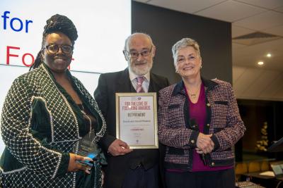 Dulcie and David Pheonix have retired after an incredible 23 years of fostering, pictured with Councillor Jacqui Coogan, Cabinet Member for Children, Young People and Education