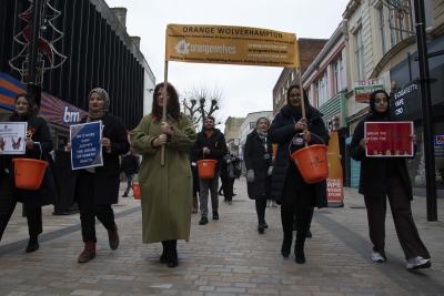 People joined a march around Wolverhampton city centre organised by ROSHNI to highlight the Orange Wolverhampton campaign