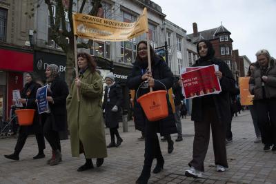 People joined a march around Wolverhampton city centre organised by ROSHNI to highlight the Orange Wolverhampton campaign