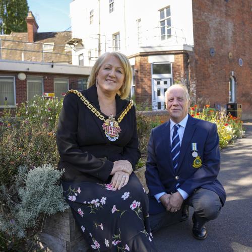 Mayor Councillor Linda Leach and Falklands Conflict veteran Neil Binder enjoy Bilston War Memorial Garden