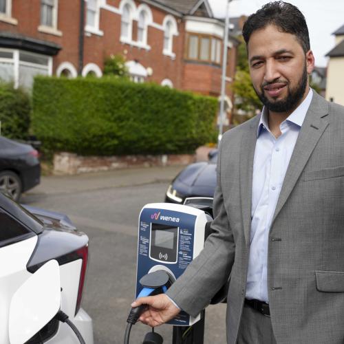 Councillor Qaiser Azeem, City of Wolverhampton Council cabinet member for transport and green city, with one of the first on street charging points in Merridale Crescent, Wolverhampton