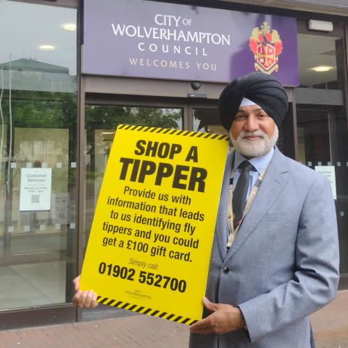 Councillor Bhupinder Gakhal, cabinet member for resident services at City of Wolverhampton Council, with contact details for the Shop a Tipper scheme