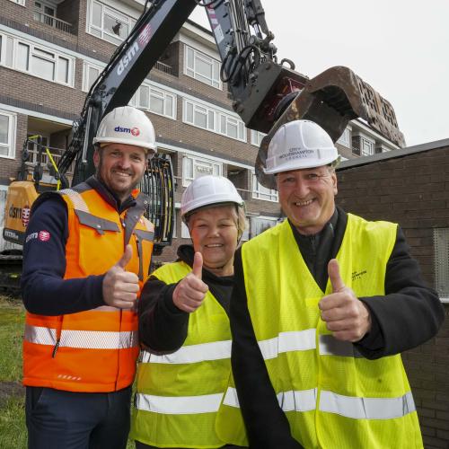 (L-R): DSM Demolition Ltd Group Business Development Director, Richard Jones, Chair of New Park Village Committee and Resident Steering Group Member, Val McKean, and City of Wolverhampton Council Deputy Leader and Cabinet Member for City Housing, Cllr Steve Evans, outside one of the bungalows undergoing demolition